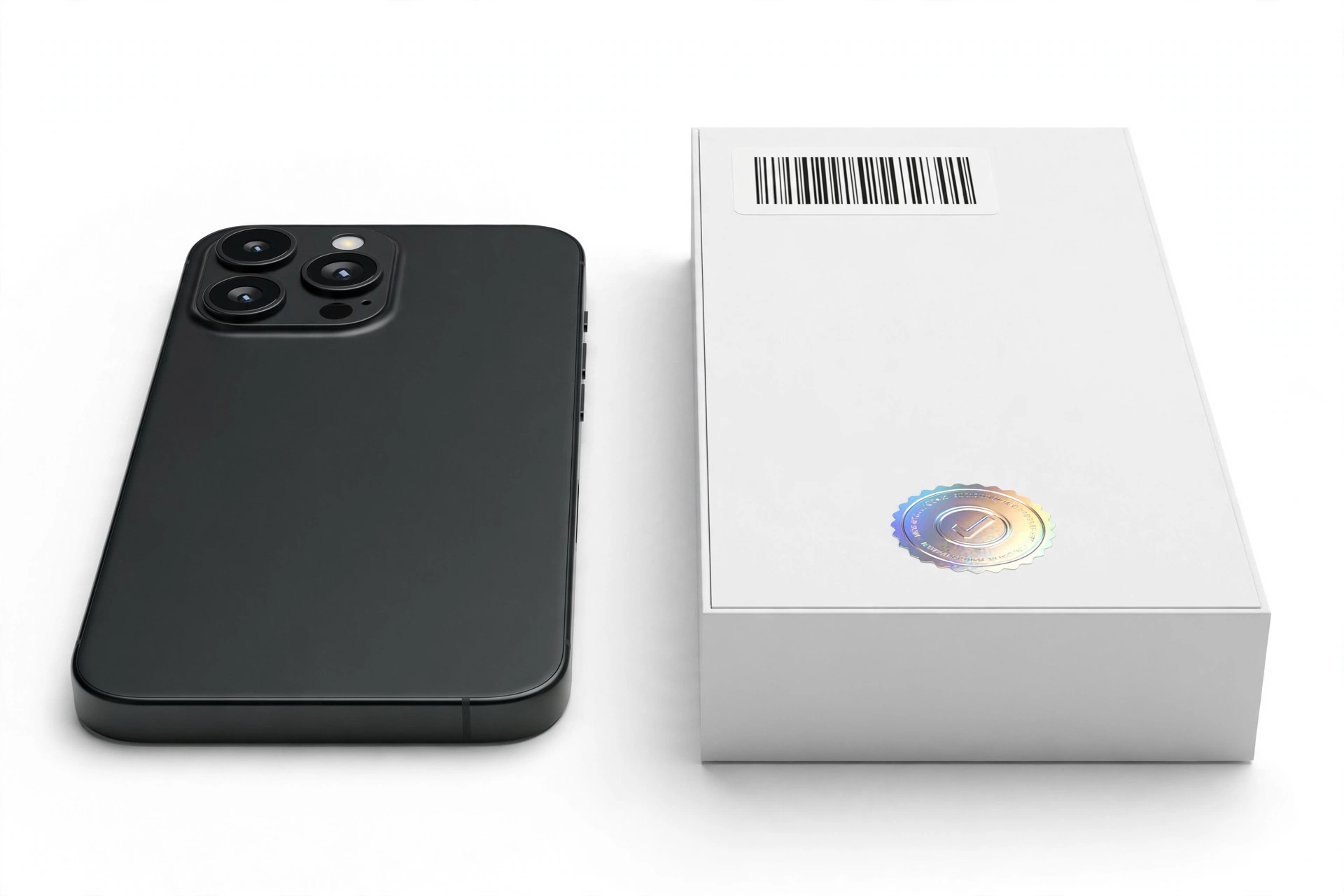 Smartphone next to its retail box with barcode and serial number verification labels