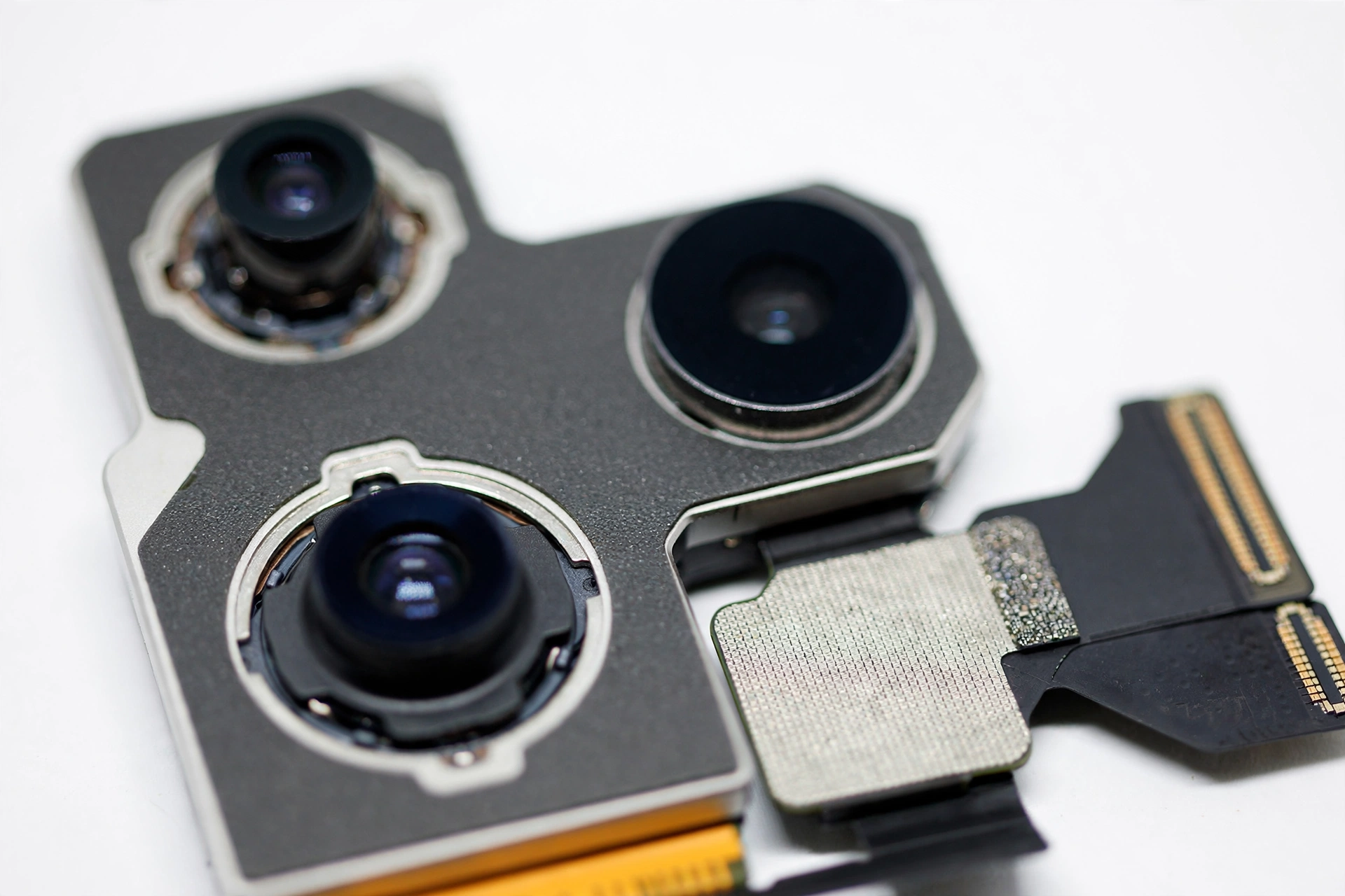 Close-up of an iPhone rear camera module with a focus problem