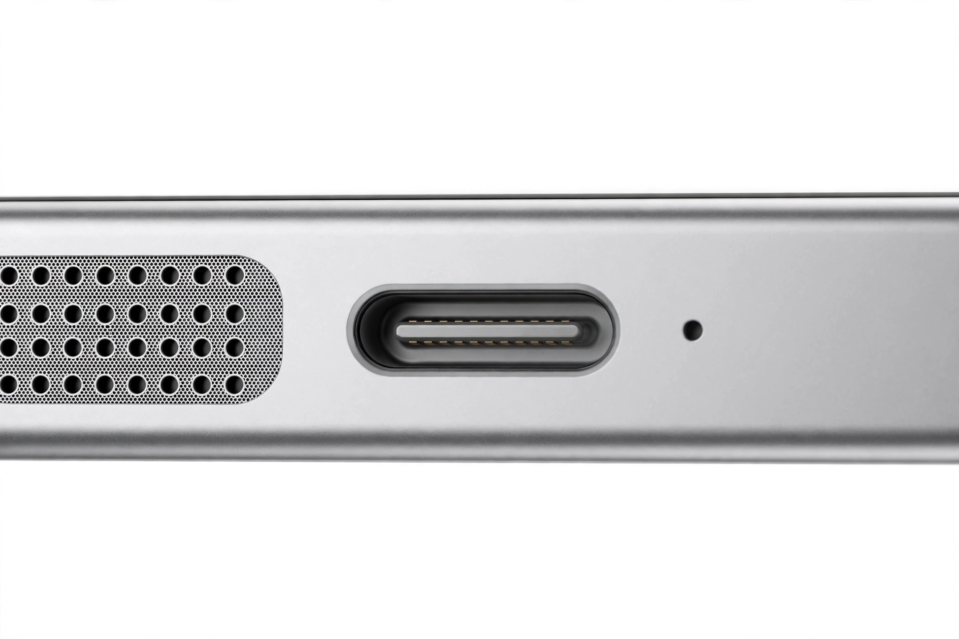 Close-up of smartphone speaker grille and charging port